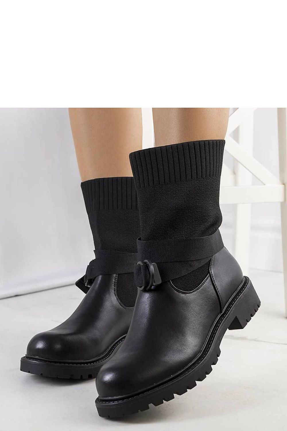 Solea Black Ricky Boots showcasing eco leather and flexible textile, ideal for stylish winter outfits, available in EU sizes 36-41.