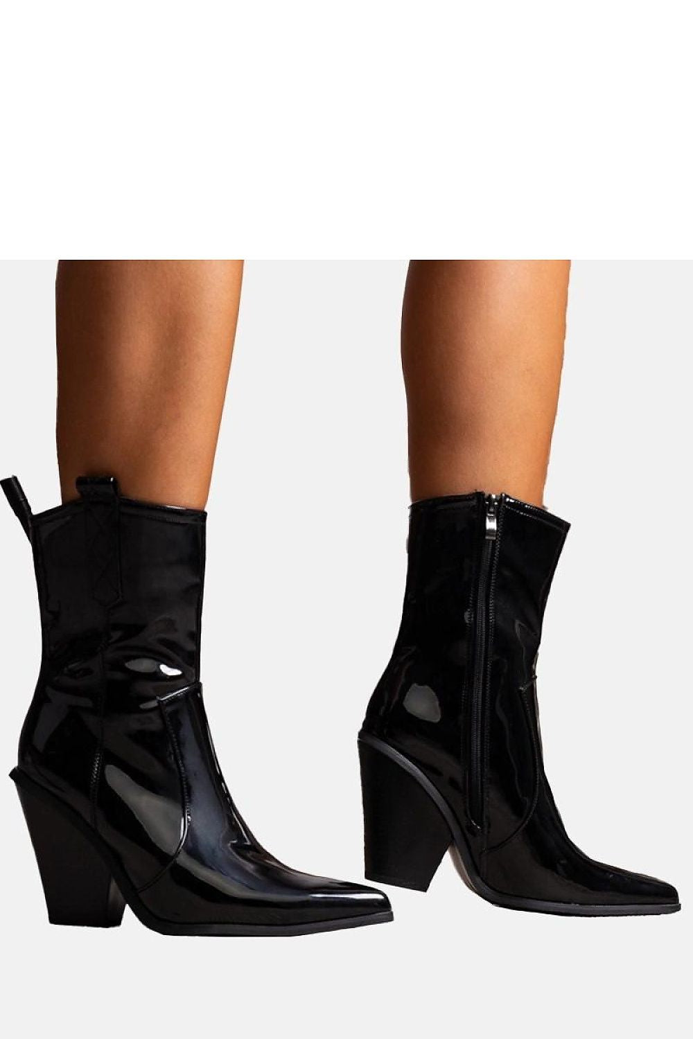 Solea's Milva Cowboy Heel Boots for Women featuring a comfortable warm interior and trendy zipper closure, ideal for chic colder weather looks.