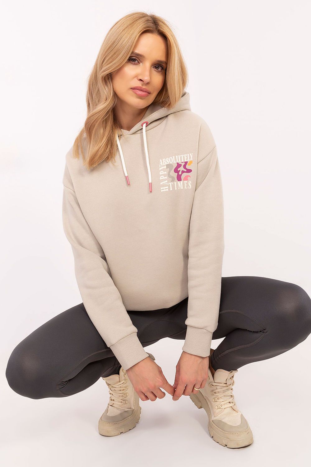Sublevel women's luxurious hoodie sweatshirt, designed for comfort and style, featuring a hood and slip-in pockets for everyday practicality.