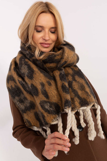 Stylish detailed view of AT's elegant polyester scarf with animal motif, featuring fringes, ideal for elevating winter ensembles with sophistication.