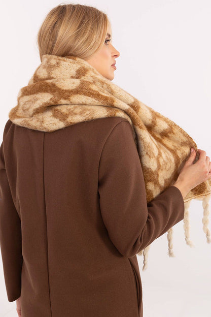 Elegant lifestyle image of the 214 cm polyester shawl scarf by AT, draped gracefully over an outfit, emphasising its warmth and sophisticated style.