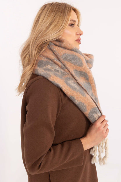 Fashionably elegant 214 cm shawl scarf from AT, crafted in soft polyester with eye-catching animal motifs and luxurious fringes.