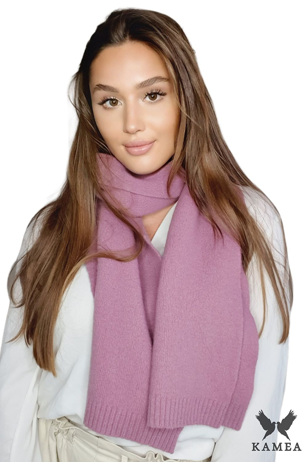 Luxurious camel wool scarf by Kamea draped elegantly, showcasing the rich texture and warmth suitable for winter styling.