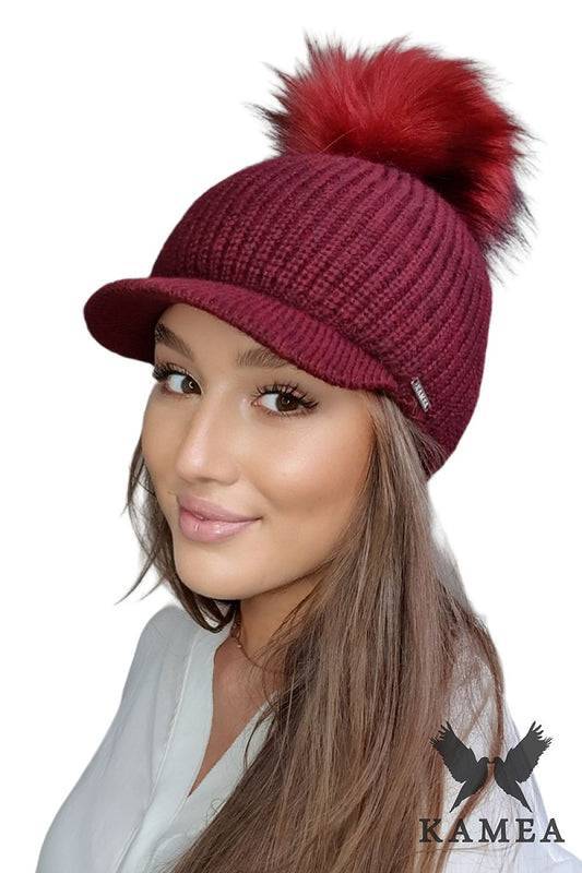Elegant burgundy winter women's hat by Kamea featuring luxurious mohair fabric and a fluffy pompon.