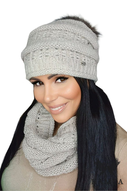 Elegant presentation of Kamea's Liana Women's Winter Hat in heather colour, demonstrating the fine craftsmanship and warmth for luxury winter styling.