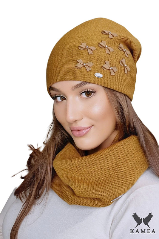 Luxury mustard women's hat by Kamea, featuring elegant pleated design and pearl accents, perfect for autumn and winter styling.