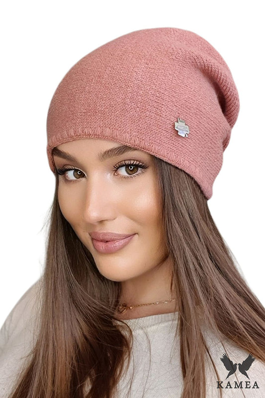 Elegant premium coral ARIBA women's hat by Kamea, crafted from soft hypoallergenic alpaca wool and viscose blend, showcasing a classic design with a shell edge and silver clover emblem.