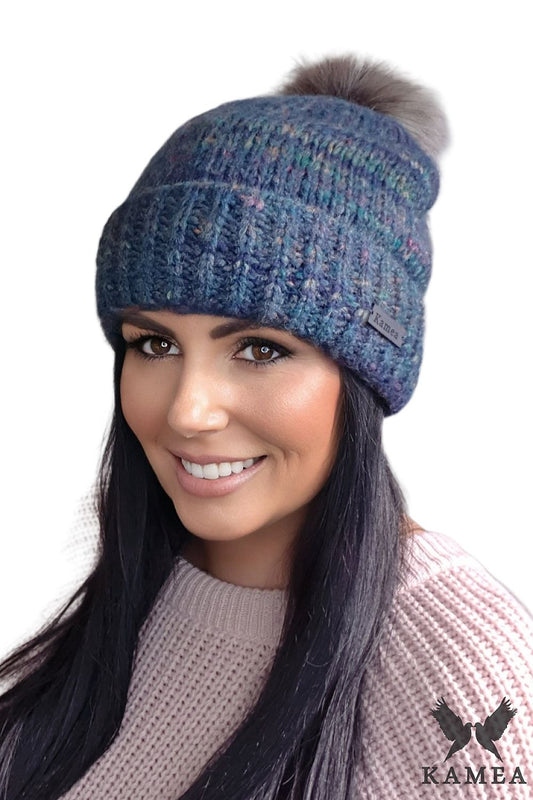 Luxury Gaja Women's Hat by Kamea featuring a natural green pom-pom and intricate elegant pattern, crafted from high-quality yarn for comfort and style.