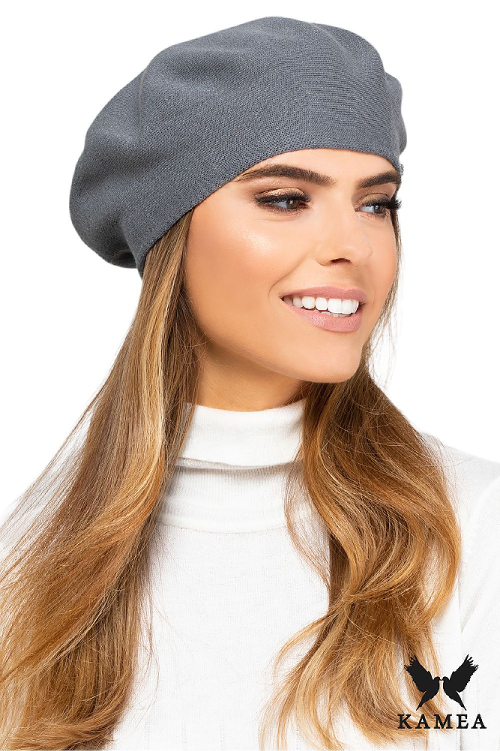 Premium coral women’s beret by Kamea, an elegant viscose fashion accessory featuring a soft texture and a silver logo, perfect for stylish looks in cool spring and autumn weather.