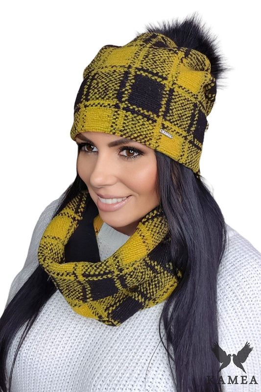 Luxurious Kamea Premium Gambit Women's Mustard Winter Set featuring a stylish wool hat with a fur pom-pom and a chic checkered scarf, perfect for cold weather.