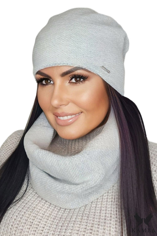 Kamea's Premium Women's Winter Set Amelia featuring an elegant light grey hat and scarf made from high-quality wool, designed for ultimate comfort and sophistication during cold days.