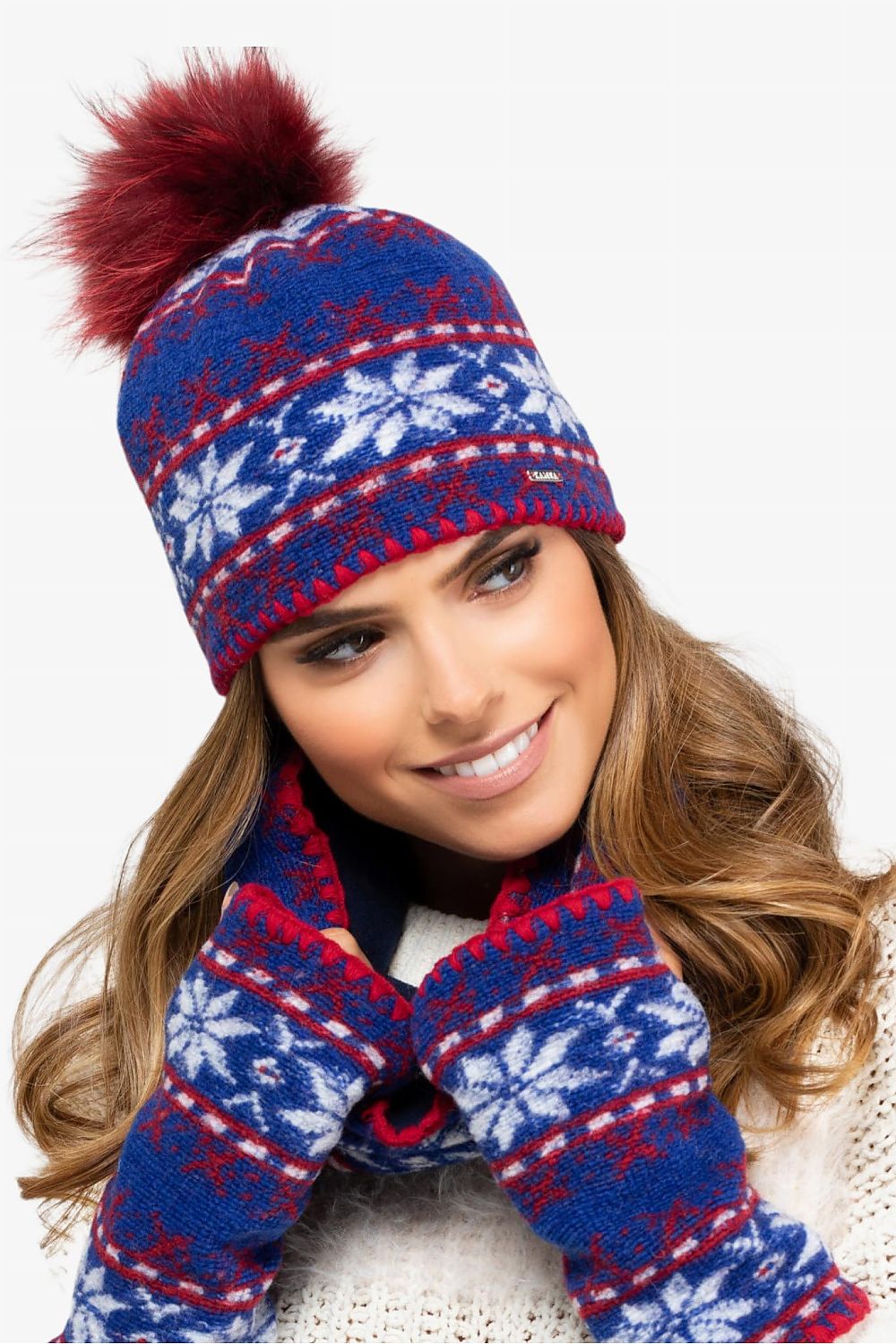 Premium Kamea Women's Annapolis Hat and Scarf Set featuring an elegant snowflake pattern and fluffy pompom, ideal for stylish winter days.