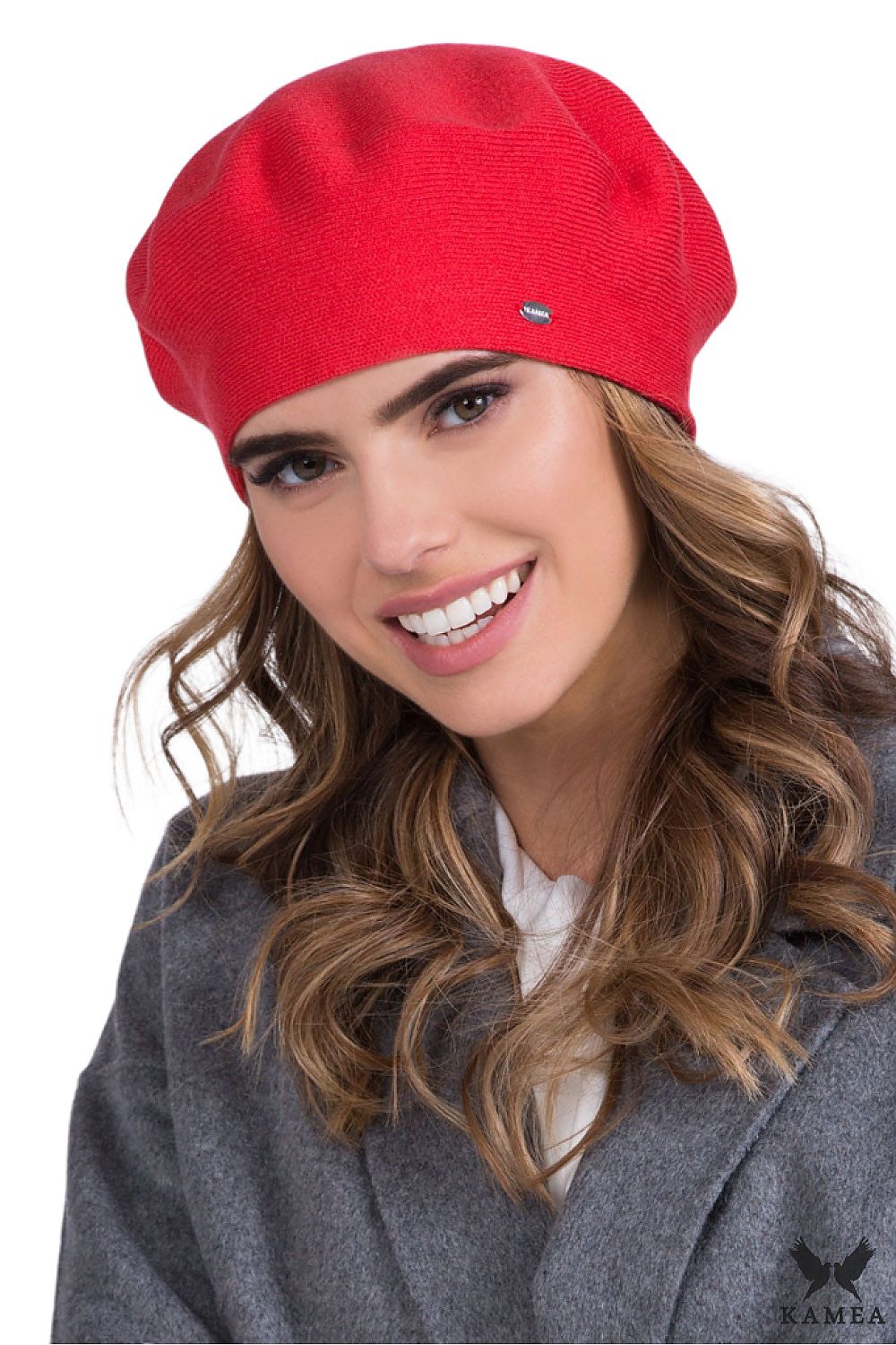 Elegant women's accessory, Kamea INEZZ beret in rich fuchsia, crafted from high-quality yarn for superior comfort and sophistication.