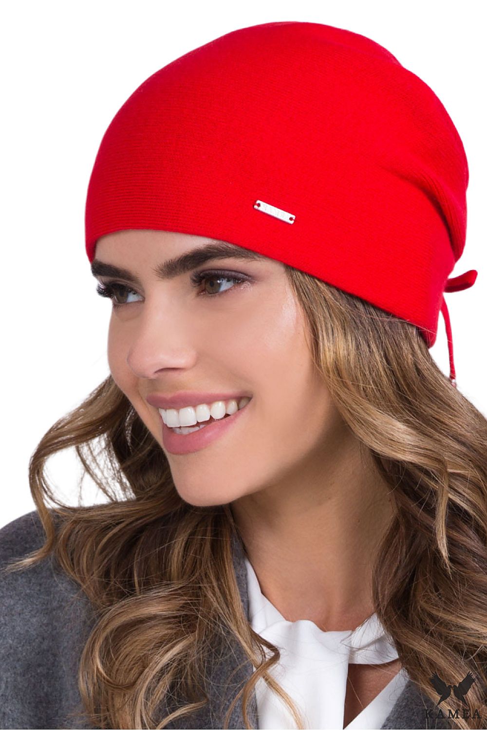 Premium coral women's hat by Kamea, showcasing classic elegance with lined warmth and adorned with a silver emblem, perfect for stylish winter attire.