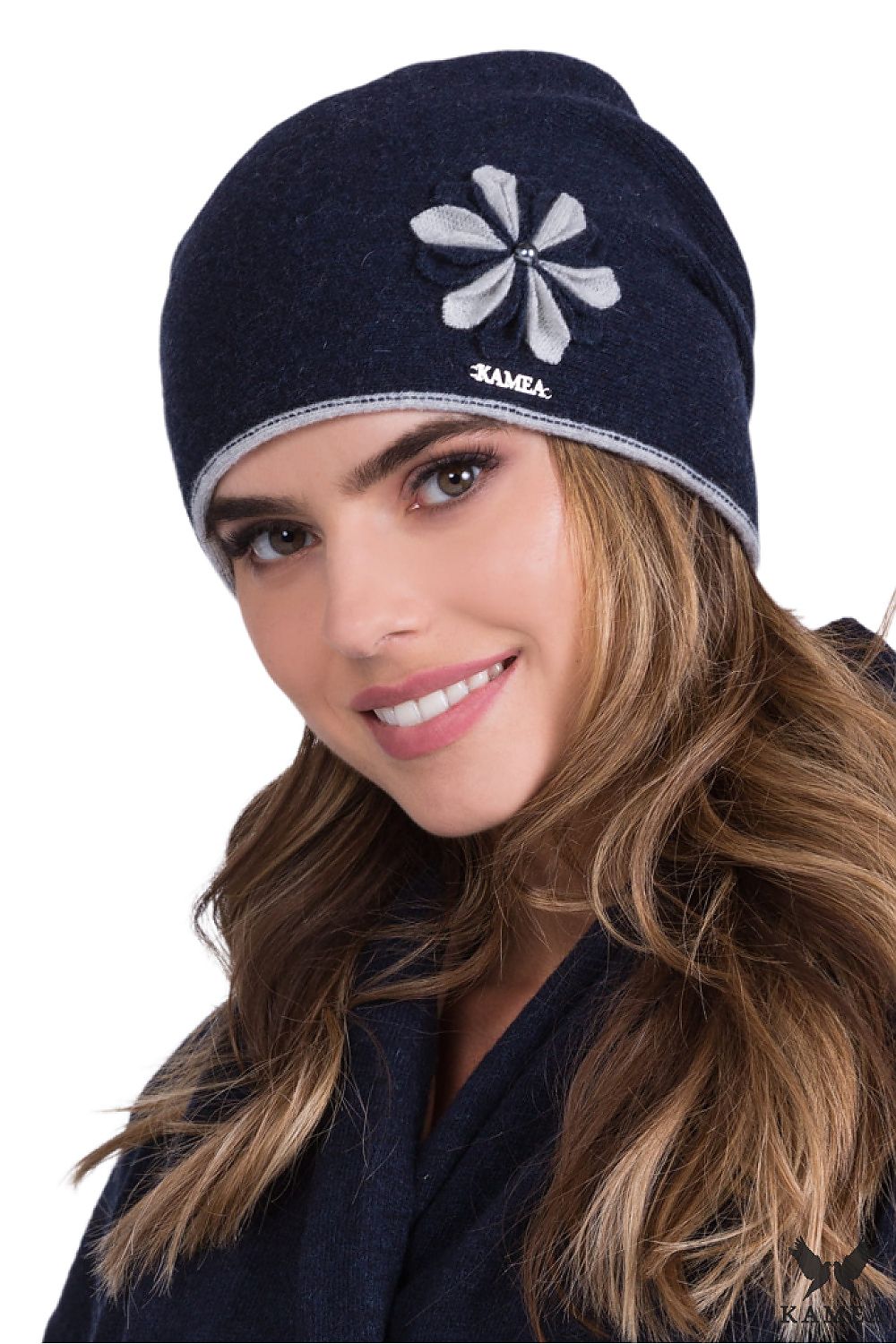 Elegant navy blue woolen women's hat by Kamea, adorned with a beautiful floral decoration and crafted for a perfect fit, ideal for autumn-winter fashion.