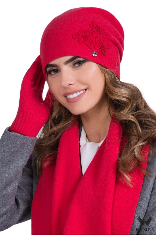 Elegant coral wool hat for women by Kamea, featuring luxurious fluffy applications and exquisite beaded detailing, perfect for winter fashion.