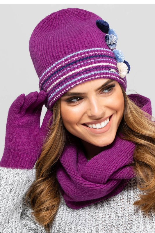 Close-up view of the Kamea Colorado Youth Hat with vibrant fuchsia pom-poms, showcasing its exquisite craftsmanship and soft texture, designed for girls who appreciate elegance and quality.