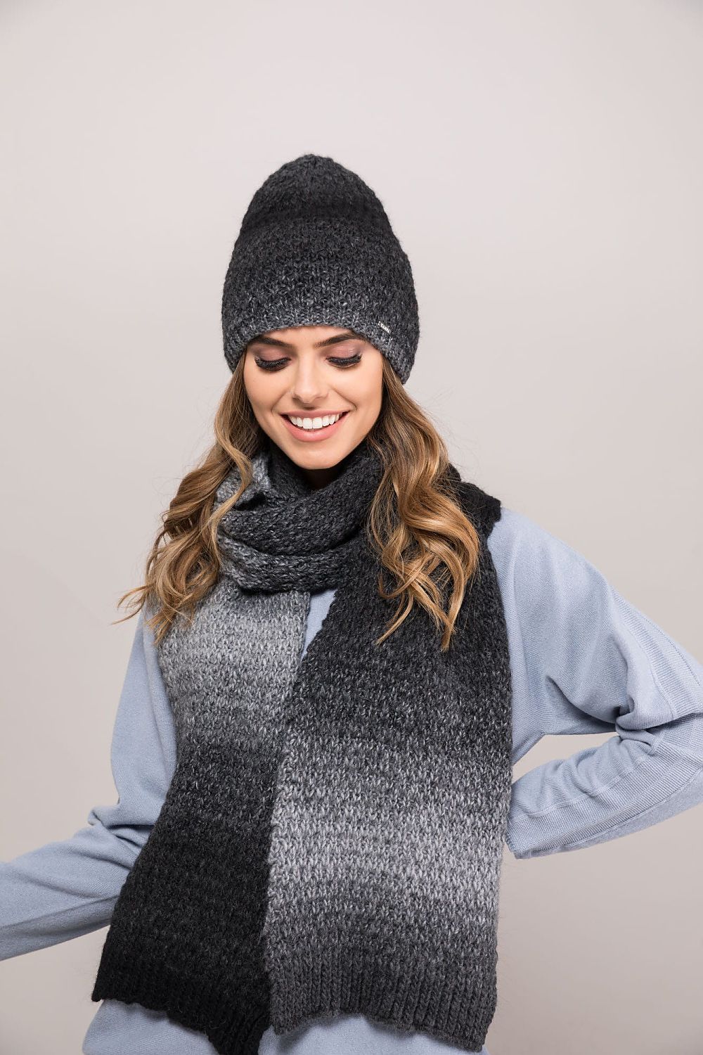 Elegant Kamea Women's Black Graphite Winter Hat, crafted with high-quality yarn and alpaca wool providing warmth and comfort for chic cold weather attire.