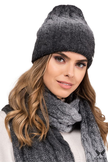 Premium Kamea women's black beanie hat featuring luxurious alpaca wool lining and intricate braided stitches, perfect for winter warmth and style.