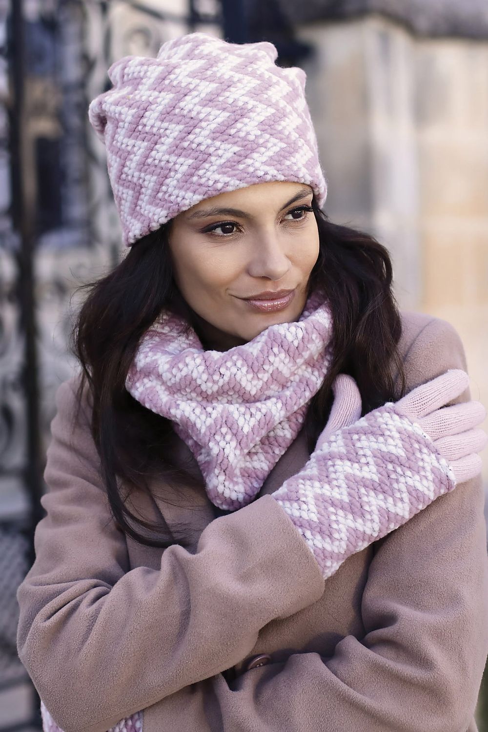 Luxury warm pink Kamea Madison eco pom-pom hat featuring a stylish zigzag pattern, perfect for autumn and winter wear.