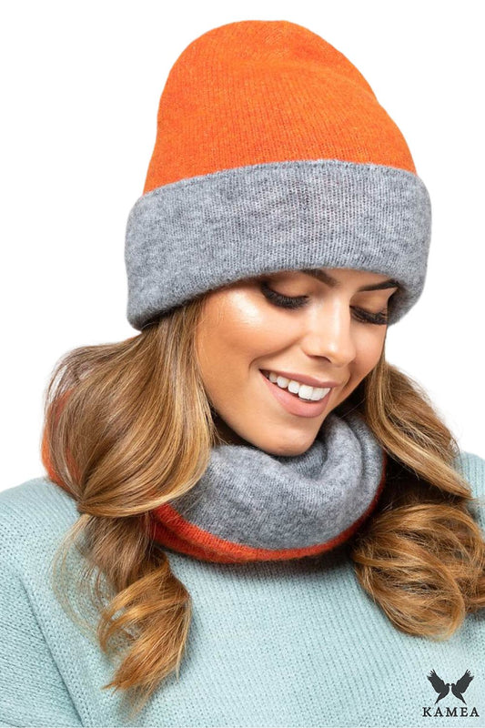 Luxurious double-sided women's hat by Kamea in brown-grey, designed for comfort and warmth, showcasing versatile styling options.