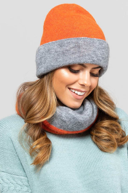 Elegant Kamea Bilbao double-sided hat in soft brown-grey fabric, perfect for cold days, exuding luxury and sophisticated charm.