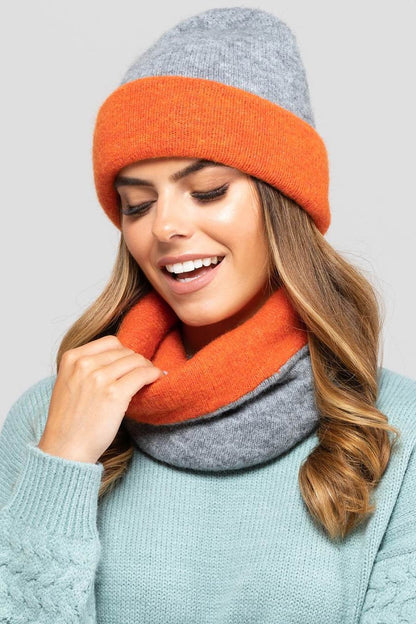 Kamea's luxury Bilbao hat in soft brown-grey, showcasing unique double-sided wear for exquisite comfort and warmth.