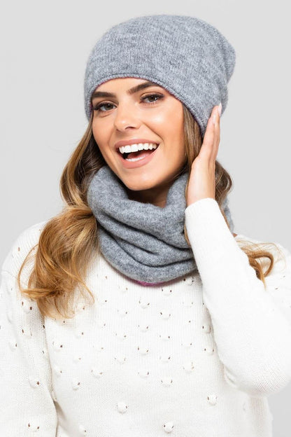 Stylish Kamea Bilbao women's hat, exquisitely designed in brown-grey, ideal for completing sophisticated winter ensembles.