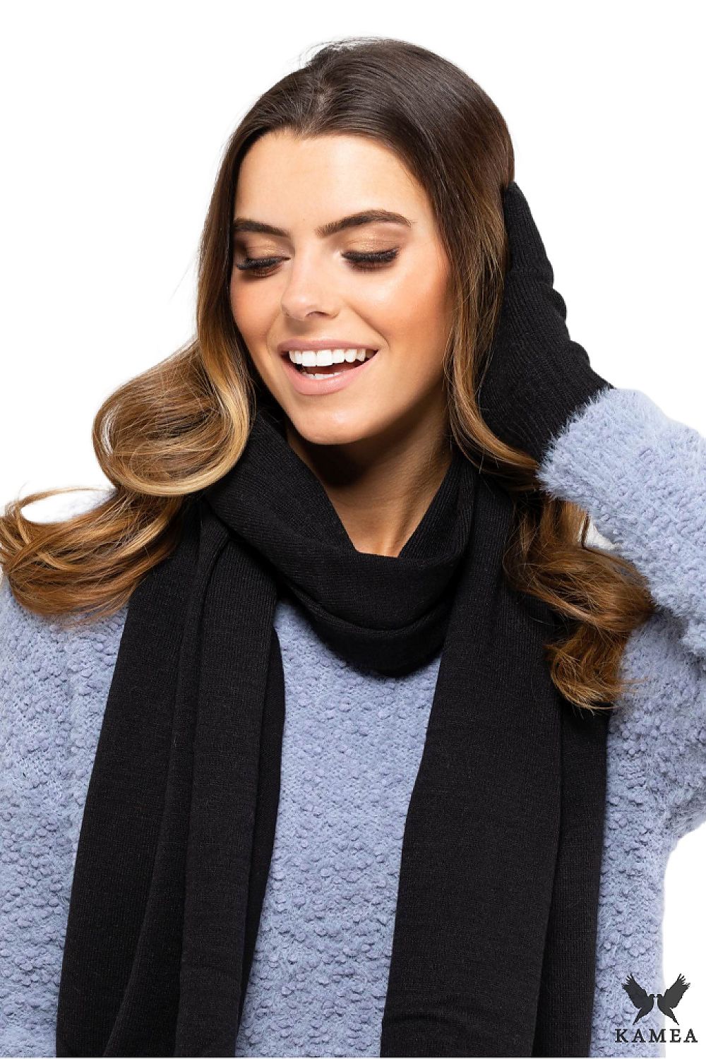 Sophisticated mustard scarf by Kamea, showcasing warmth and comfort perfect for winter style.