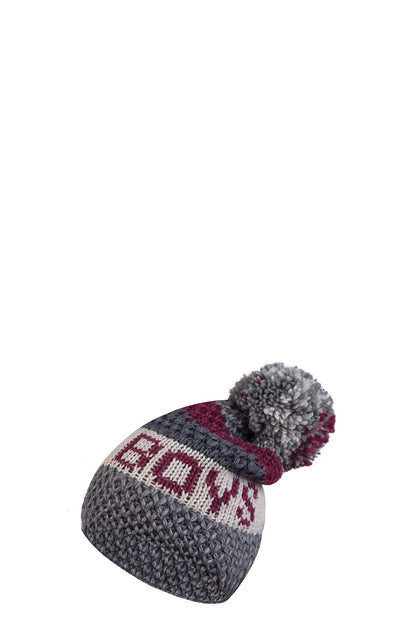 Chic fuchsia knitted women's hat from Kamea, embellished with unique patterns and a plush pompom, perfect for cold weather.