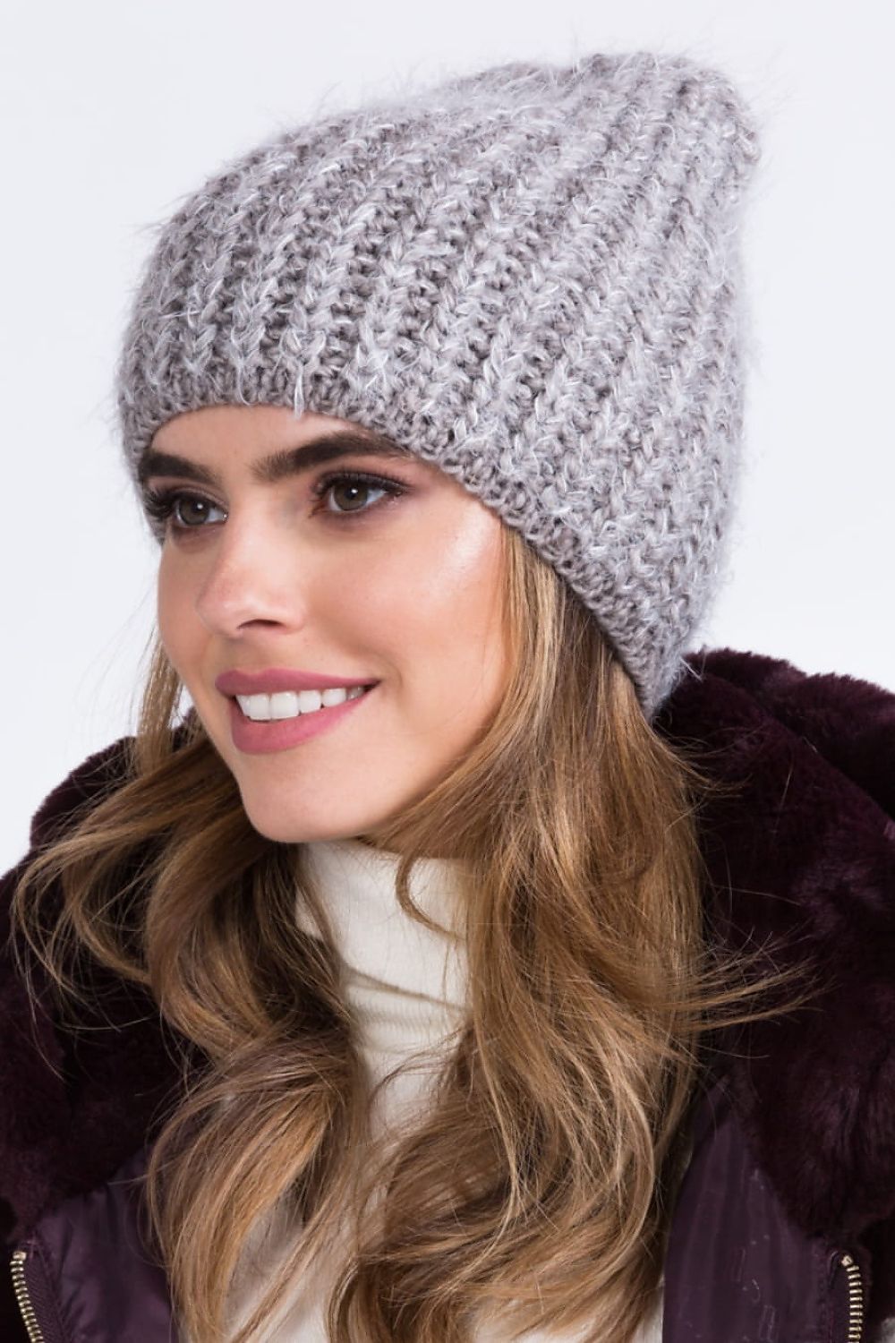 Luxurious dark beige Hermina hat for women by Kamea, intricately designed with classic ribbing for comfort during cold days.