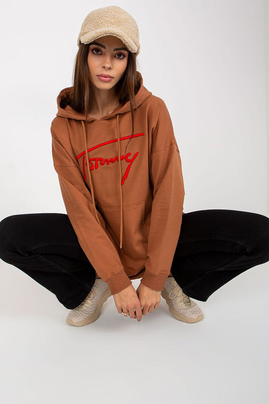Luxury Women's Long Casual Sweatshirt by Factory Price, featuring a comfortable cotton blend, hood, kangaroo pocket, and stylish side slits, perfect for fashionable everyday wear.