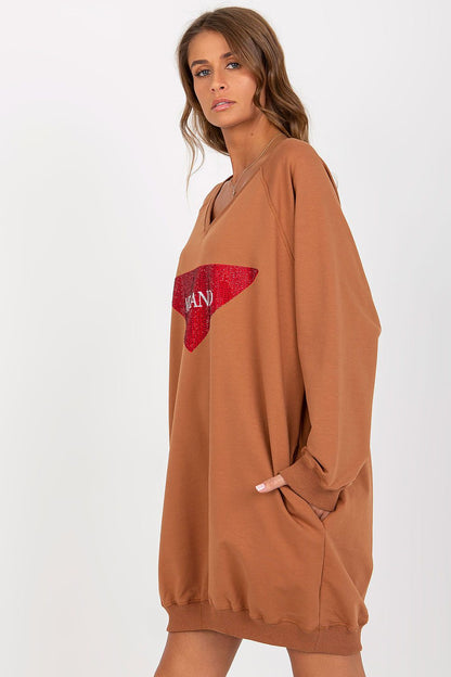Close-up of the detailed jet stone embellishments on the fashionable long casual sweatshirt by Factory Price.