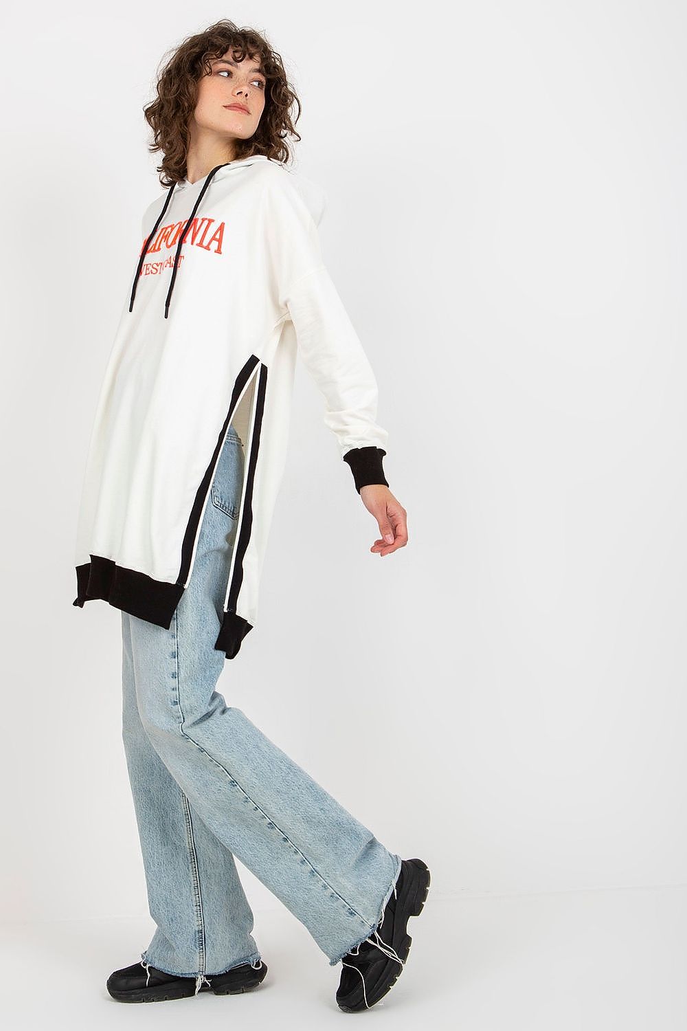 Luxurious women's long casual sweatshirt with hood and side slits, crafted from a high-quality cotton blend by Factory Price, offering stylish versatility and comfort.