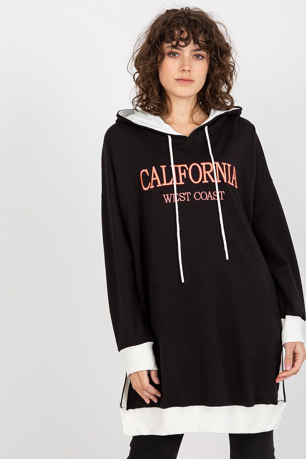 Fashionable long casual hoodie for women with an extended cut, featuring a luxurious cotton polyester blend by Factory Price, ideal for trendy outfits.