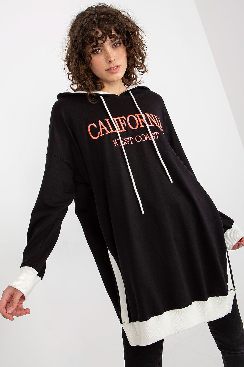 Stylish women's long sweatshirt with a modern silhouette and comfort-focused design, available from Factory Price, perfect for a versatile wardrobe.