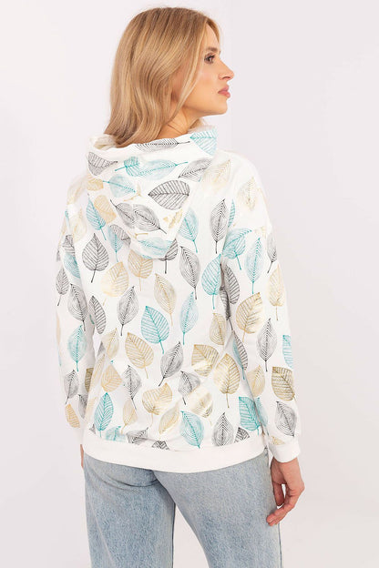 Model wearing the Factory Price luxury women's hooded sweatshirt, demonstrating its stylish fit and practical hood for a chic layering look.