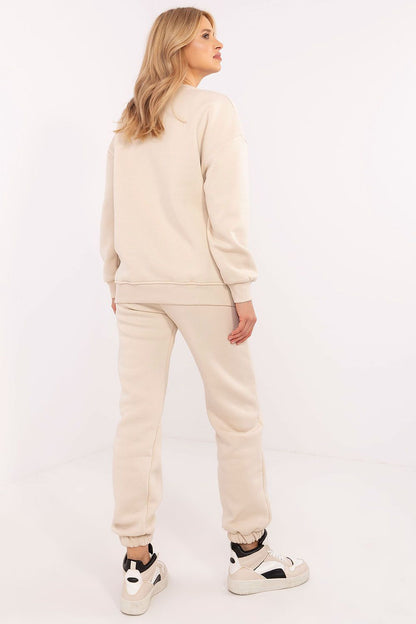 Full display of the Luxury Women's Tracksuit Set by Factory Price, emphasizing the chic design with high waist pants and insulated materials, suitable for cooler days.