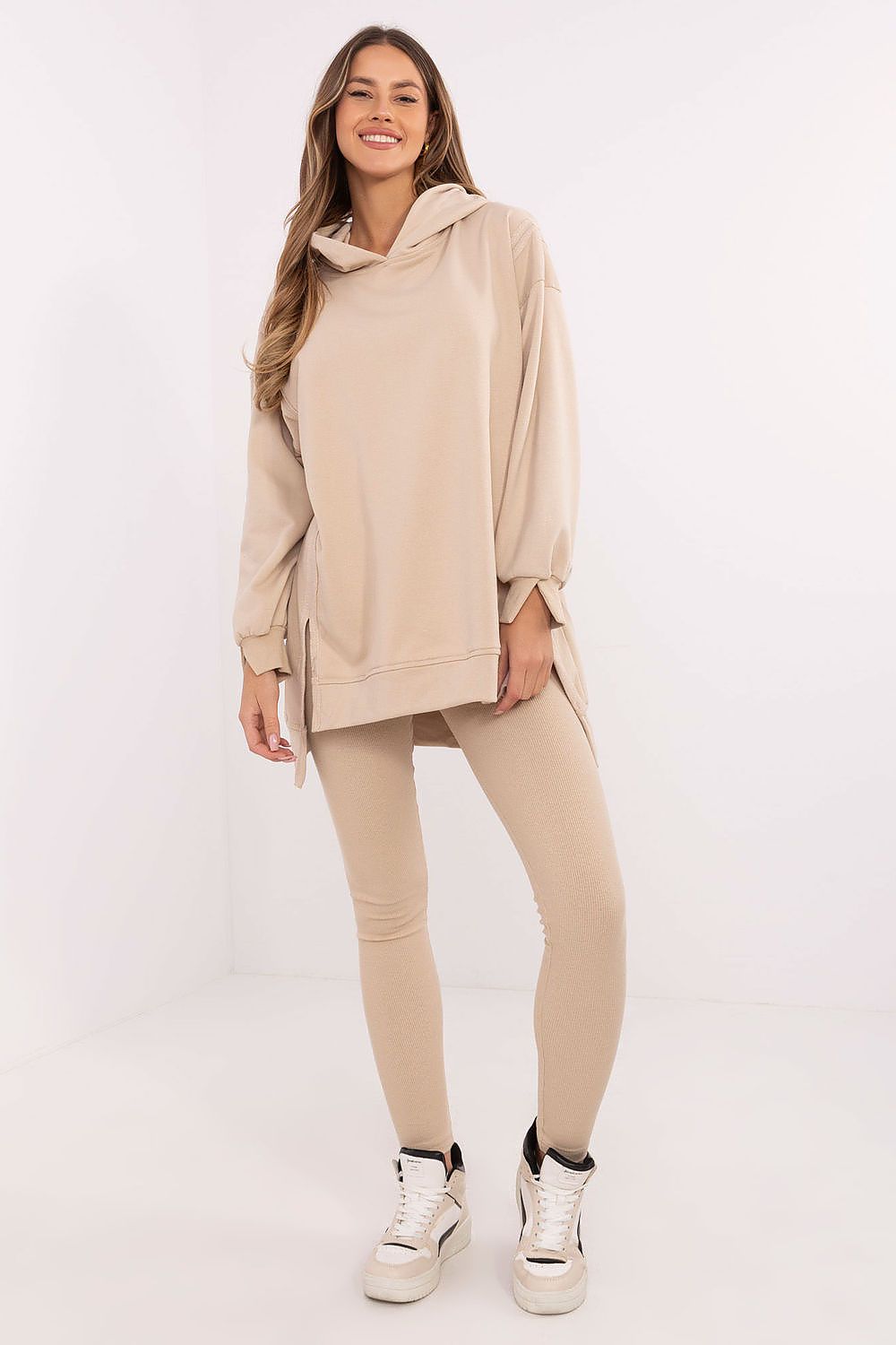 Luxury women's 2-piece set featuring a long sweatshirt and high-waisted leggings, designed by Factory Price, showcasing modern comfort and style.