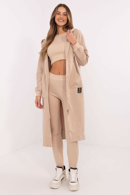 Chic high-waisted leggings from Factory Price's luxury women's set, showcasing a ribbed structure and tapered legs for a flattering silhouette.