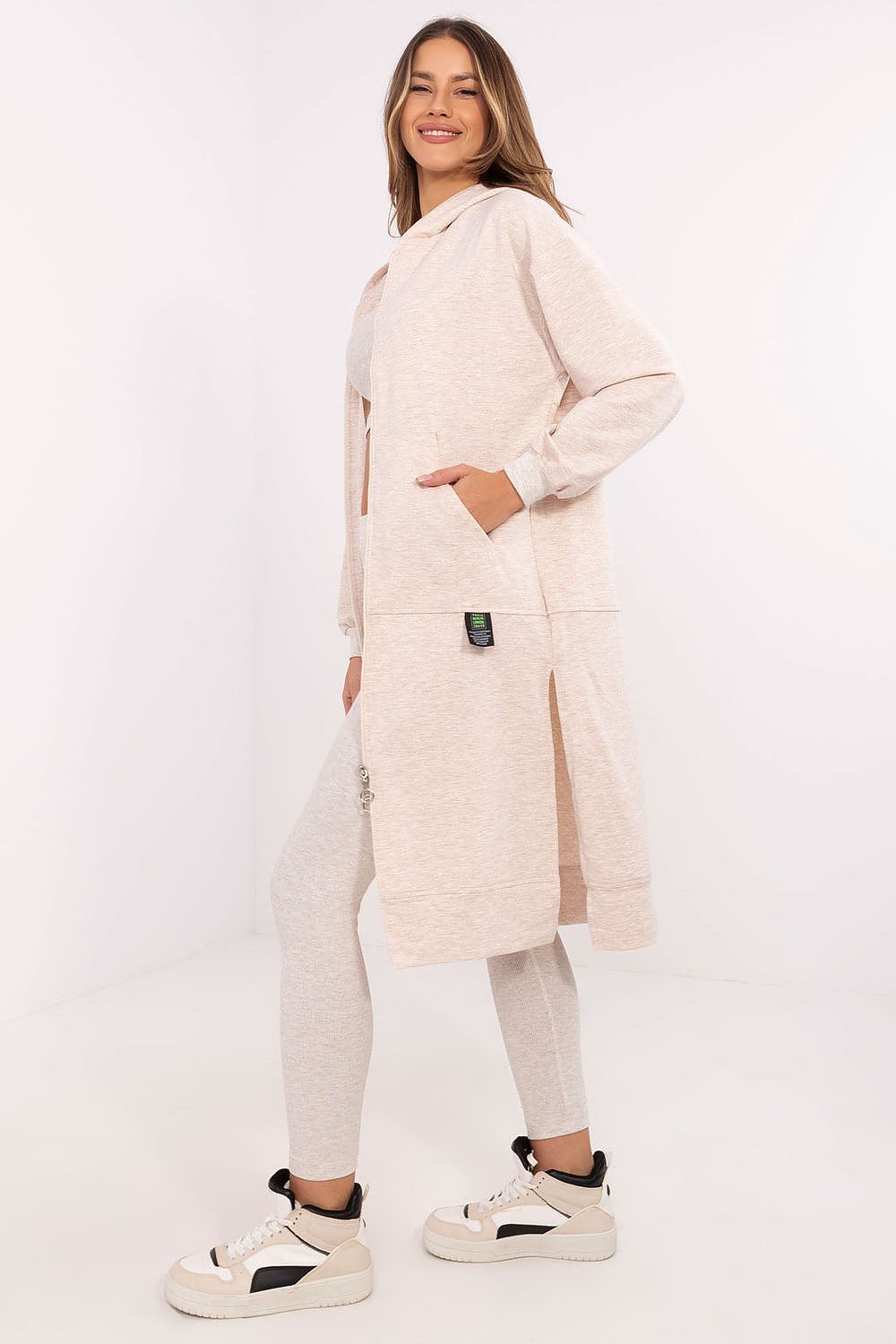 Elegant hoodie from Factory Price's Women's 3-Piece Set showcasing a modern extended cut and practical zip fastening for a sporty yet luxurious look.