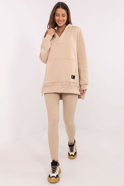 Stylish long blouse with spacious hood and kangaroo pocket from the Luxury Women's 3-Piece Set by Factory Price.