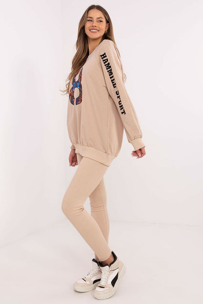 Stylish high-waisted leggings in soft cotton blend from Factory Price, perfectly complementing the luxury women's sweatshirt.