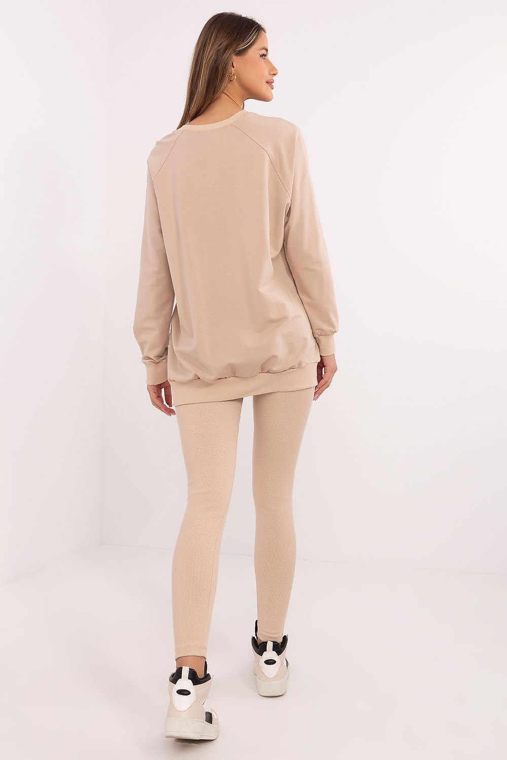 Chic women's outfit showcasing the luxury sweatshirt with unique embroidery details, crafted by Factory Price for a fashionable look.