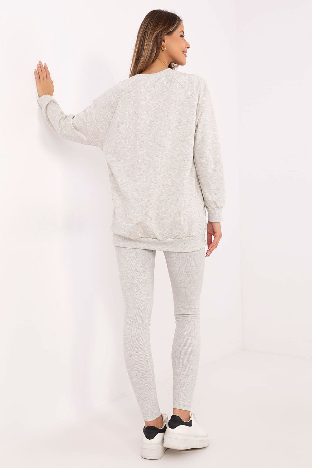 Chic high-waisted leggings and soft sweatshirt ensemble by Factory Price, designed for the fashionable woman.