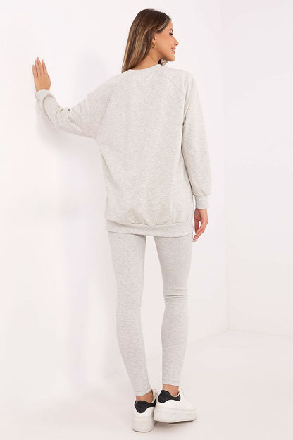 Chic high-waisted leggings and soft sweatshirt ensemble by Factory Price, designed for the fashionable woman.