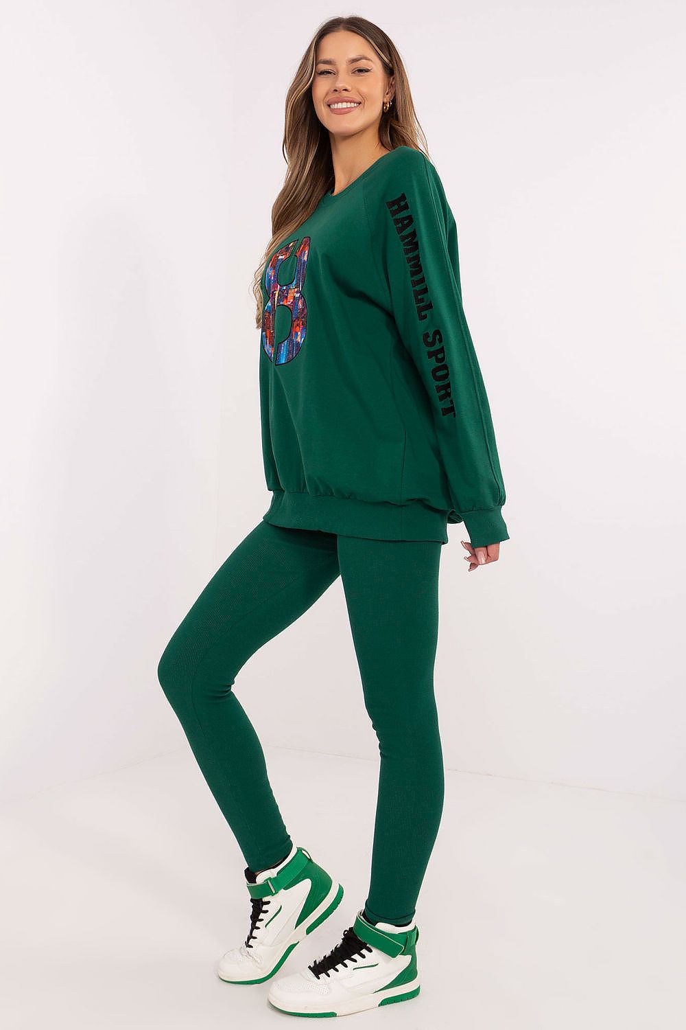 Factory Price luxury women's festive outfit, combining comfortable sweatshirt and fitted high-waisted leggings.