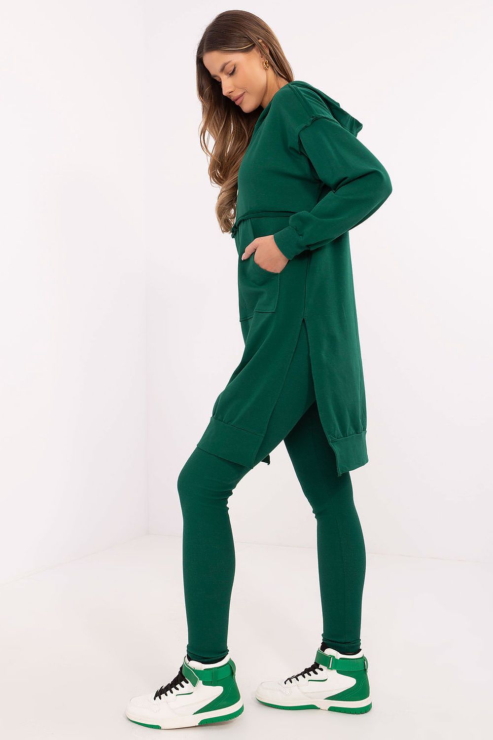 Elegant long sweatshirt in a luxury women's set by Factory Price, featuring a spacious hood and kangaroo pocket for practical and stylish casual styling.