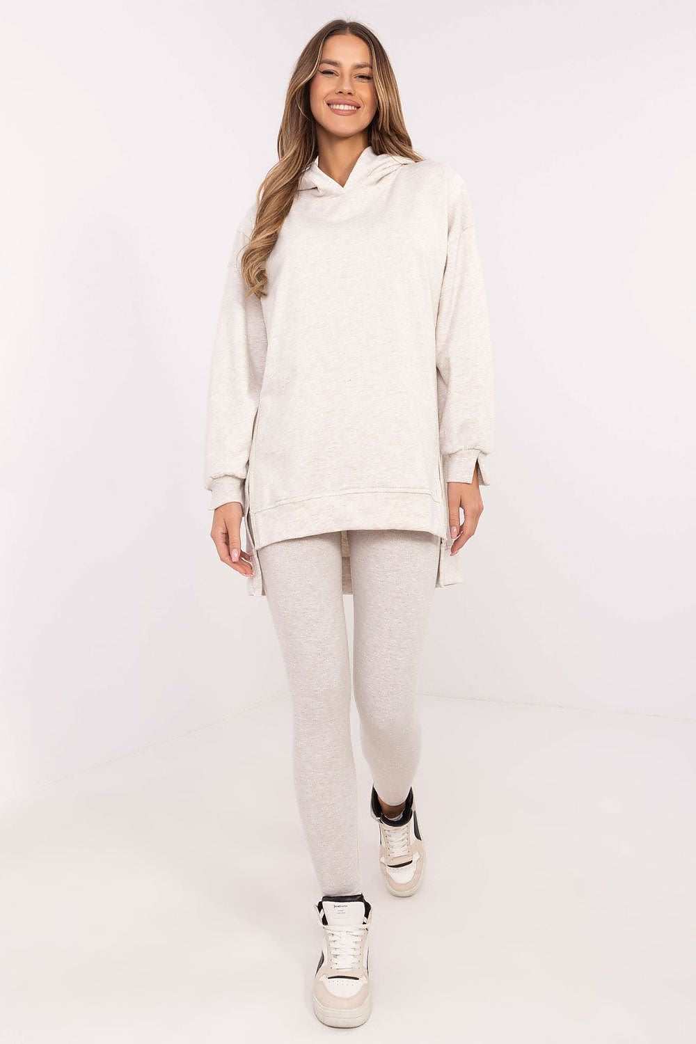Elegant women's long sweatshirt and leggings, designed by Factory Price, featuring ribbed material and a perfect fit, ideal for everyday style in EU size 0.