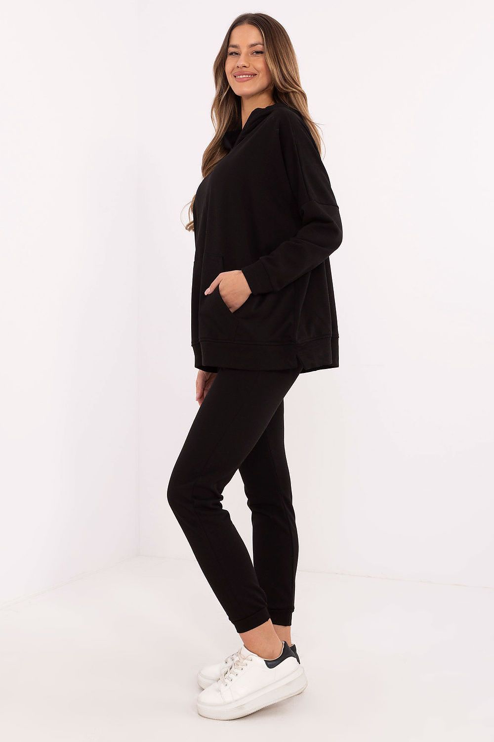 Detail shot of the luxury women's tracksuit set from Factory Price, displaying the soft cotton blend fabric and chic design.